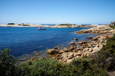 An aerial view of the Bay of Fires rocky shore in Bicheno, Australia