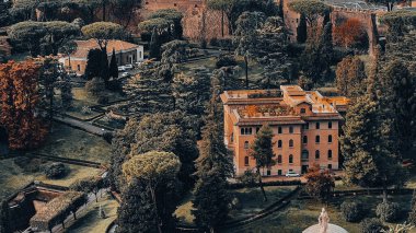 An aerial view of the Gardens of Vatican City in Rome, Italy clipart