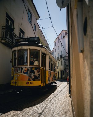 A vertical shot of a traditional tram in the city of Lisbon, Portugal