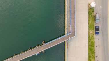 A top view of the pedestrian walkway crossing in Sheepshead Bay, Brooklyn, New York, USA