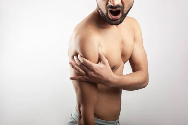 Shirtless Young Asian Guy Clutching His Shoulder Pain Deltoids Gray — Stock Photo, Image