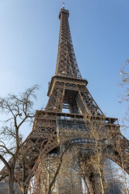 The Historical landmark Eiffel Tower from below.