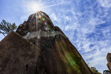 A scenic low angle of Huangshan mountain against blue sky background in Anhui, China