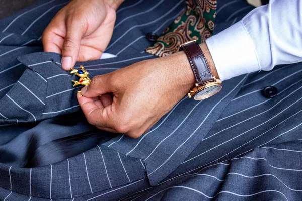 Closeup Man Hands Attaching Brooch Blue Suit — Foto Stock