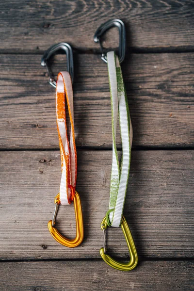 Close Detail Photo Carabiners Slings Climbing Gear Equipment Wooden Background — Stock Photo, Image