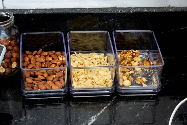 Closeup Shot Three Containers Different Nuts Kitchen — Stock Photo, Image