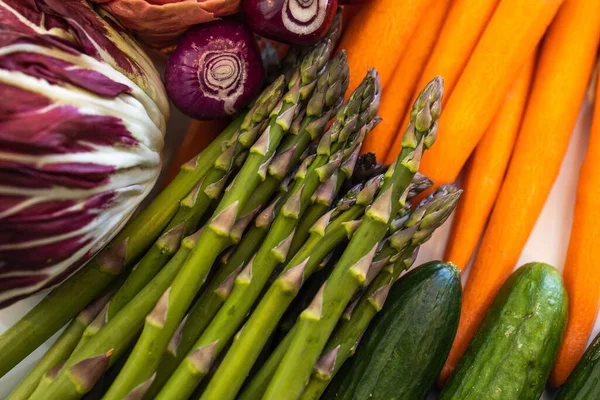 A closeup of assorted raw vegetables on the table