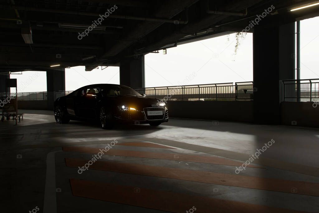A black Audi R8 4.2 Quattro in a parking facility with the hazard lights on, Antalya, Turkey
