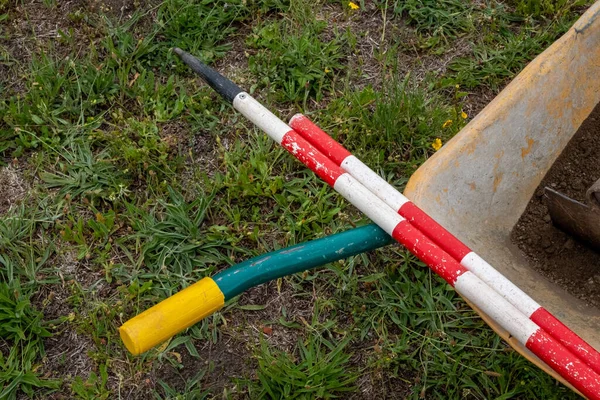 Yellow Wheelbarrow Ranging Poles Archaeological Excavation Work Concept — Stock Photo, Image