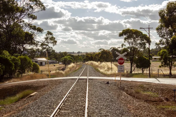Beautiful Shot Road Train Track Crossing Stop Sign Clouds — Stock Photo, Image