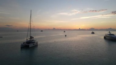 A regatta of sailboats in the Atlantic ocean in Exumas, Bahamas