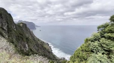 Coastline of Madeira showing sea, beaches, rocks, sky, no people