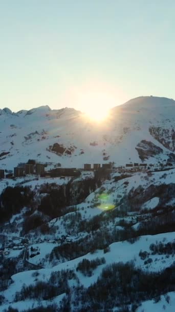Vertical Drone Footage Snow Covered Mountains Sunrays Coming — Vídeo de stock