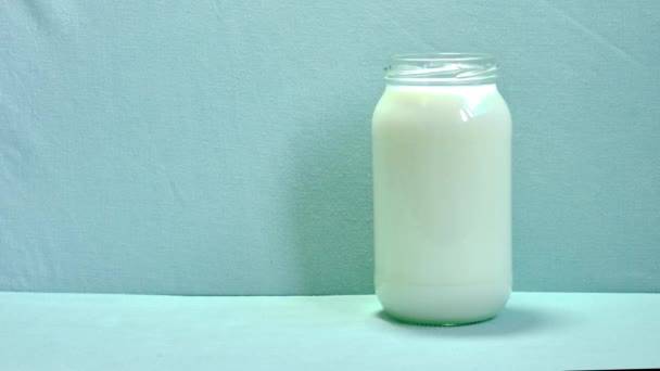 Hand Giving Start Cookies Piling Jar Milk — Stockvideo