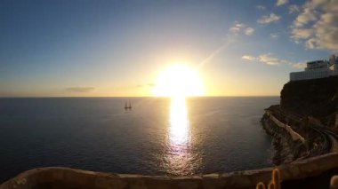 A time-lapse of a seascape in the sunset lights.