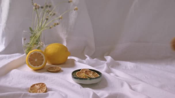 Hand Putting Dried Lemon Slices Ceramic Platter Making Tea Showing — Vídeos de Stock