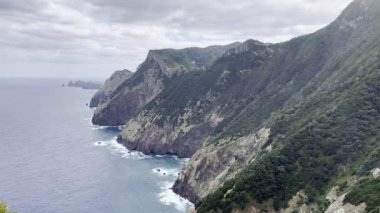 Coastline of Madeira showing sea, beaches, rocks, sky, no people