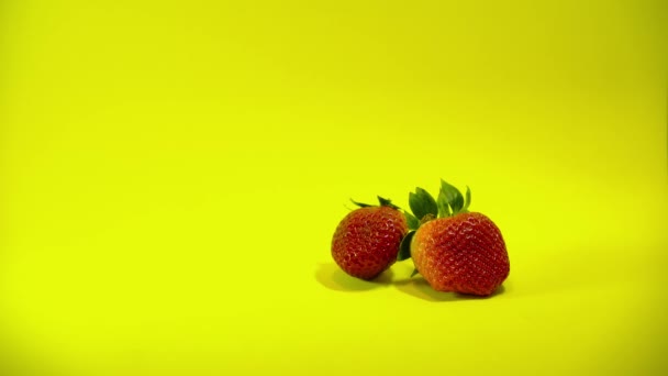 Ripe Fresh Strawberries Yellow Background — Stockvideo