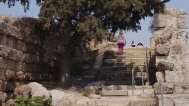 A group of travelers walking on B.C. stairs