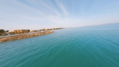 FPV drone flying very close to the lighthouse