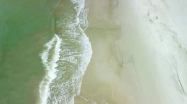 A beautiful high angle HD footage of the Naples beach coast on a sunny day