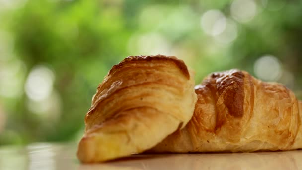 Freshly Baked Croissants Bokeh Background — Stockvideo