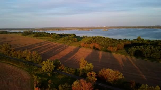 Bird Eye View Landscape Covered Green Fields Lake Sunset — Stockvideo