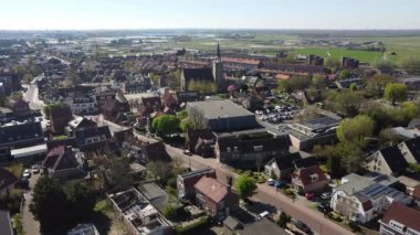 An aerial view of an old city on a sunny morning