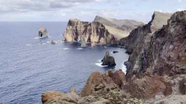 Coastline of Madeira showing sea, beaches, rocks, sky, no people