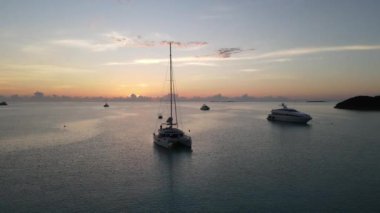 A regatta of sailboats in the Atlantic ocean in Exumas, Bahamas