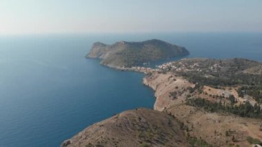 A short drone flight in Kefalonia, Greece towards Assos town.