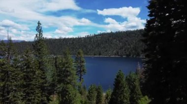 Drone shot of Emerald Bay island and trees in Lake Tahoe