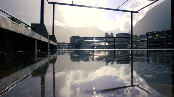 Reflective Water Cloudy Rainy Day Apartment Buildings Background — Stockvideo