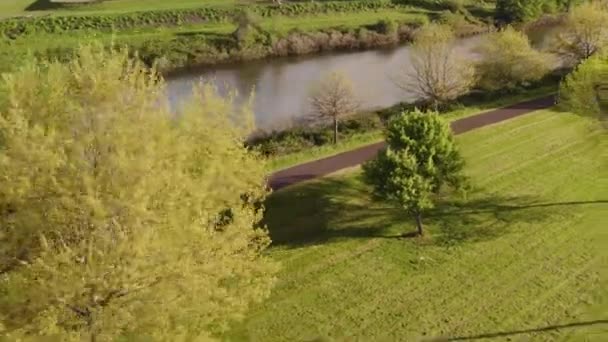 Aerial View Man Riding Bike Next Dike — Vídeo de Stock