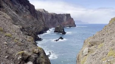 Coastline of Madeira showing sea, beaches, rocks, sky, no people