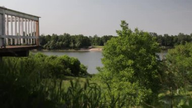 A beautiful landscape of a river surrounded by lush green nature