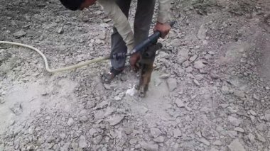 A Professional electric tools. Work of a jackhammer. Close Up