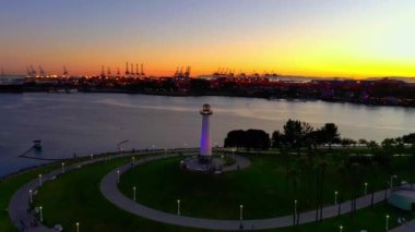 An amazing bird's eye view of an illuminated lighthouse in Long Beach, California, USA