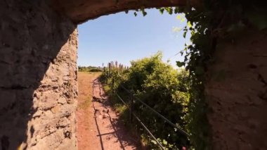 A beautiful view of the lake opening behind the wall