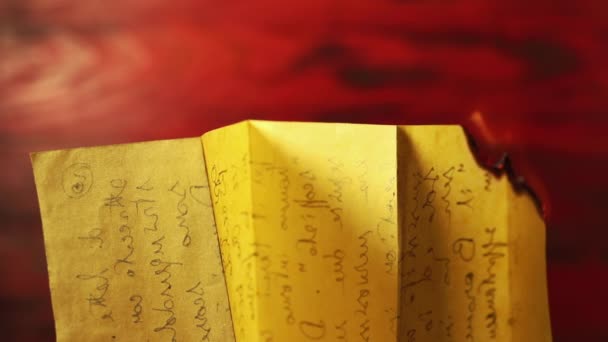 Burning Yellow Written Paper Match Red Background Mystery Sadness — Stock videók