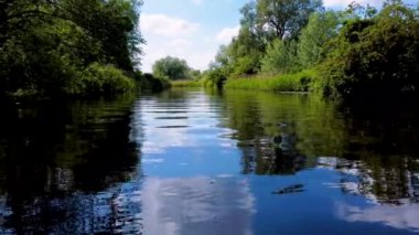 A scenic view of the river water surface in Norfolk Broads, UK