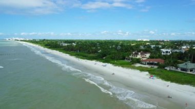 A beautiful aerial HD footage of the Naples Beach on a sunny day