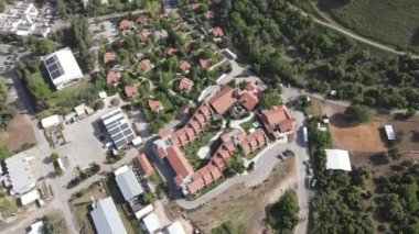 A beautiful aerial tow view HD footage of a village town near a lake in the countryside