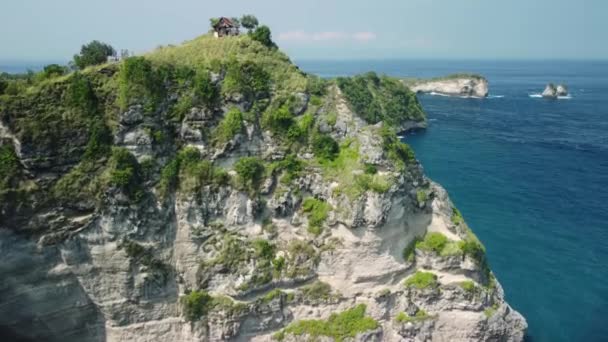 Bird Eye View Wooden House Rocky Cliff Covered Greenery Blue — 비디오