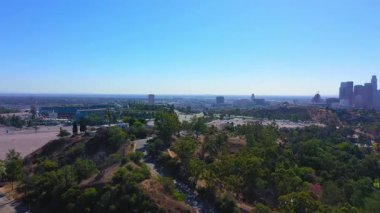 A beautiful shot of skyline buildings on mountain of Hollywood