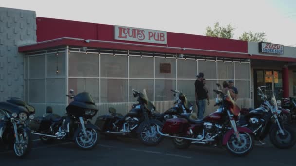 Many Motorcycles Several People Standing Talking Front Louies Pub Parking — Video