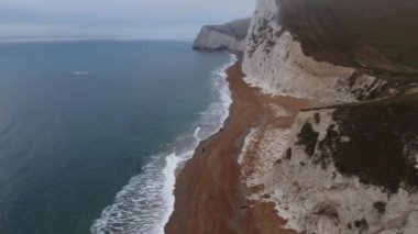 Drone footage over a beach near Durdle D