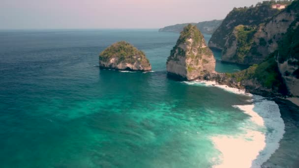 Bird Eye View Rocky Cliffs Covered Greenery Blue Sea Sunny — Vídeos de Stock