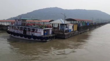 A Reaching the Elephanta Caves passenger boat station by Nautical Vessel ferry boat, Mumbai Portal, India - Elephanta Ferry Station Port