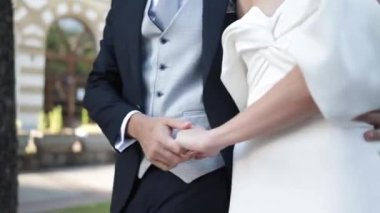 The couple walking in the wedding, making life happy being together